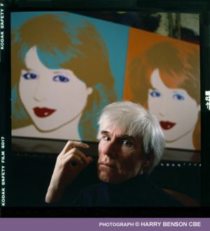 Andy Warhol with painting of Pia Zadora